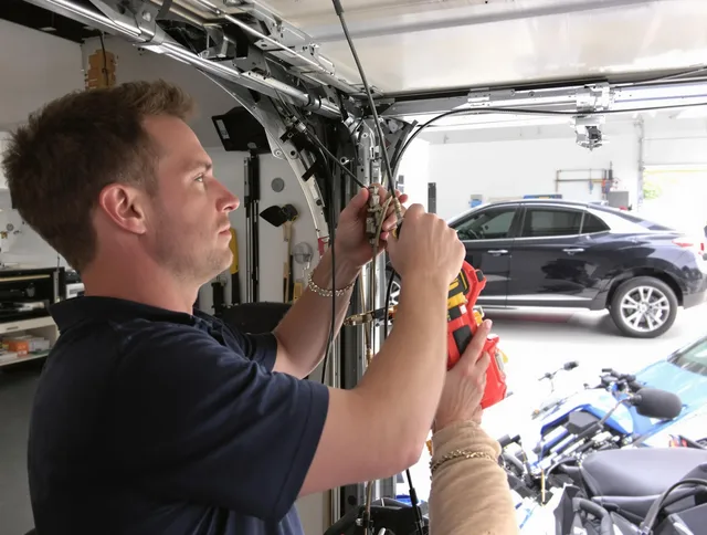 Cromwell Garage Door Repair safety certified technician performing cable replacement in Cromwell
