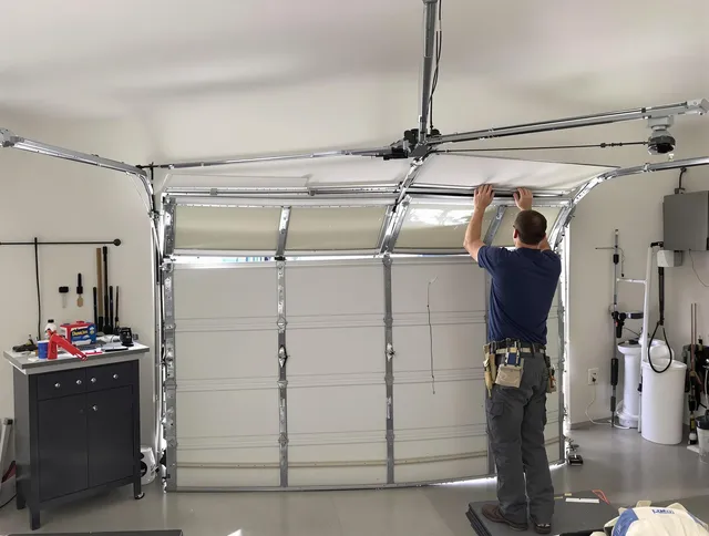 Cromwell Garage Door Repair specialist performing precise section replacement on Cromwell garage door