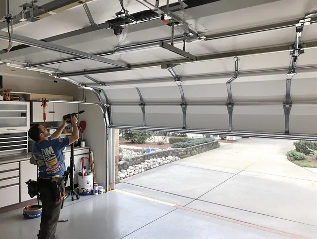 Garage door track repair service by Cromwell Garage Door Repair in Cromwell
